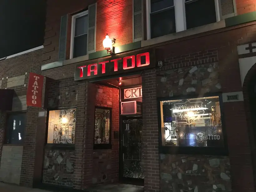 Caged Raven Tattoo Studio