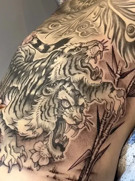 Japanese tattoo by Caged Raven