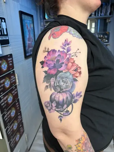 Floral tattoo by Caged Raven